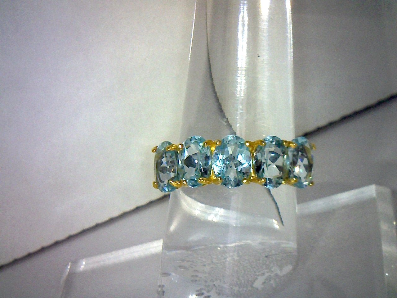 5.5 Carats Natural Blue Topaz Ring with black rhodium banding
