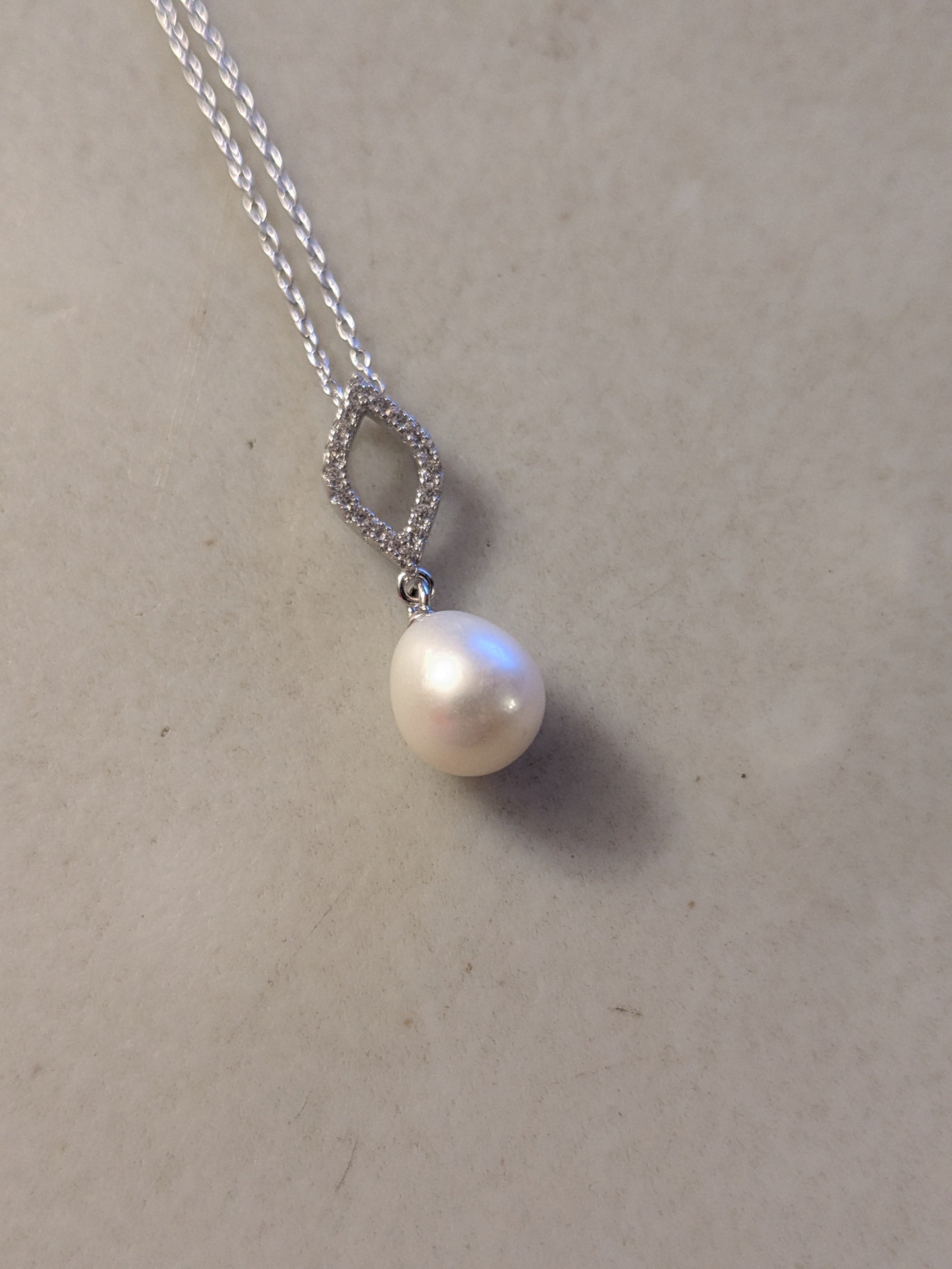 Freshwater Pearl Necklace set in Sterling Silver with optional matching earrings