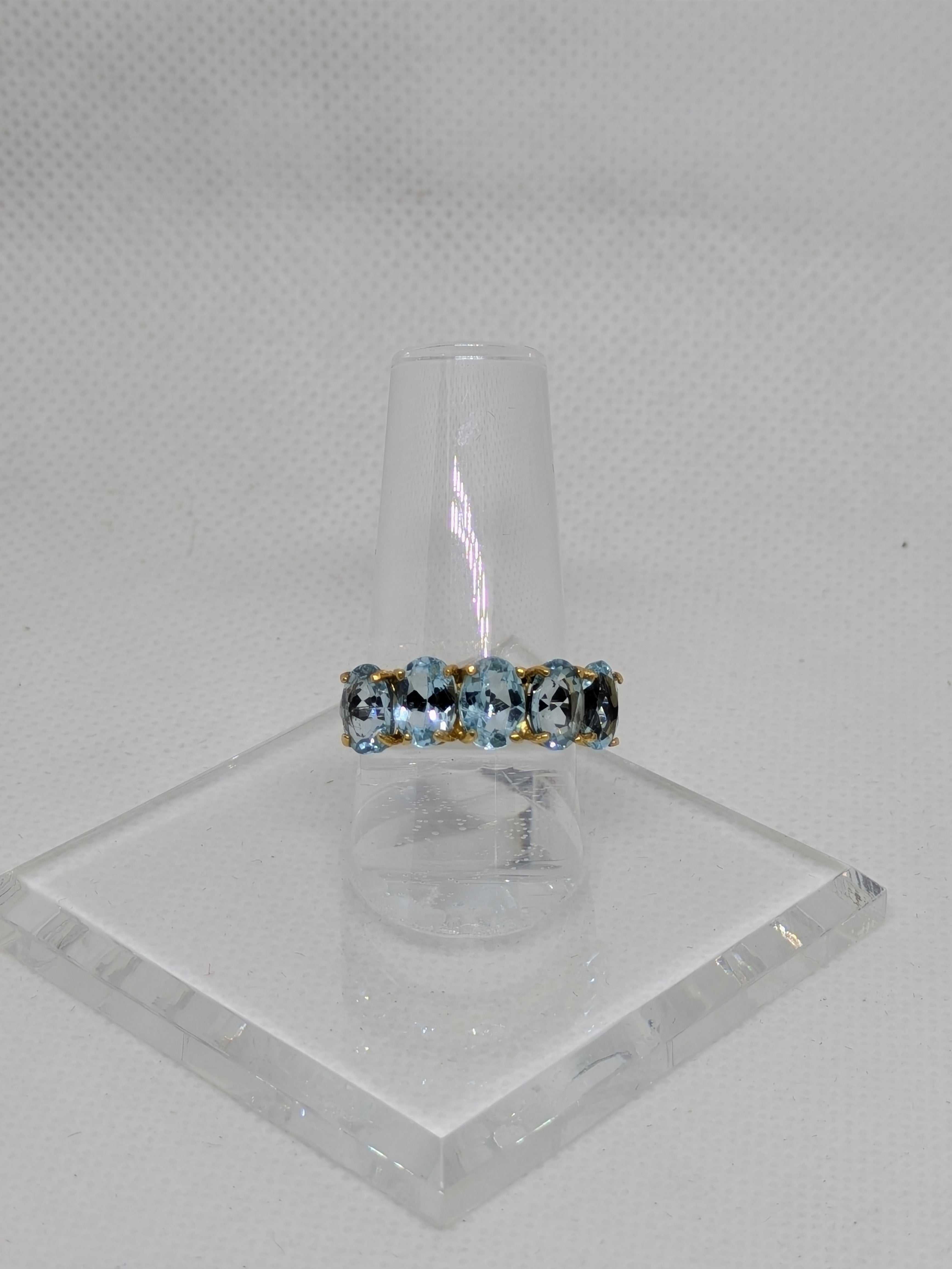 5.5 Carats Natural Blue Topaz Ring with black rhodium banding