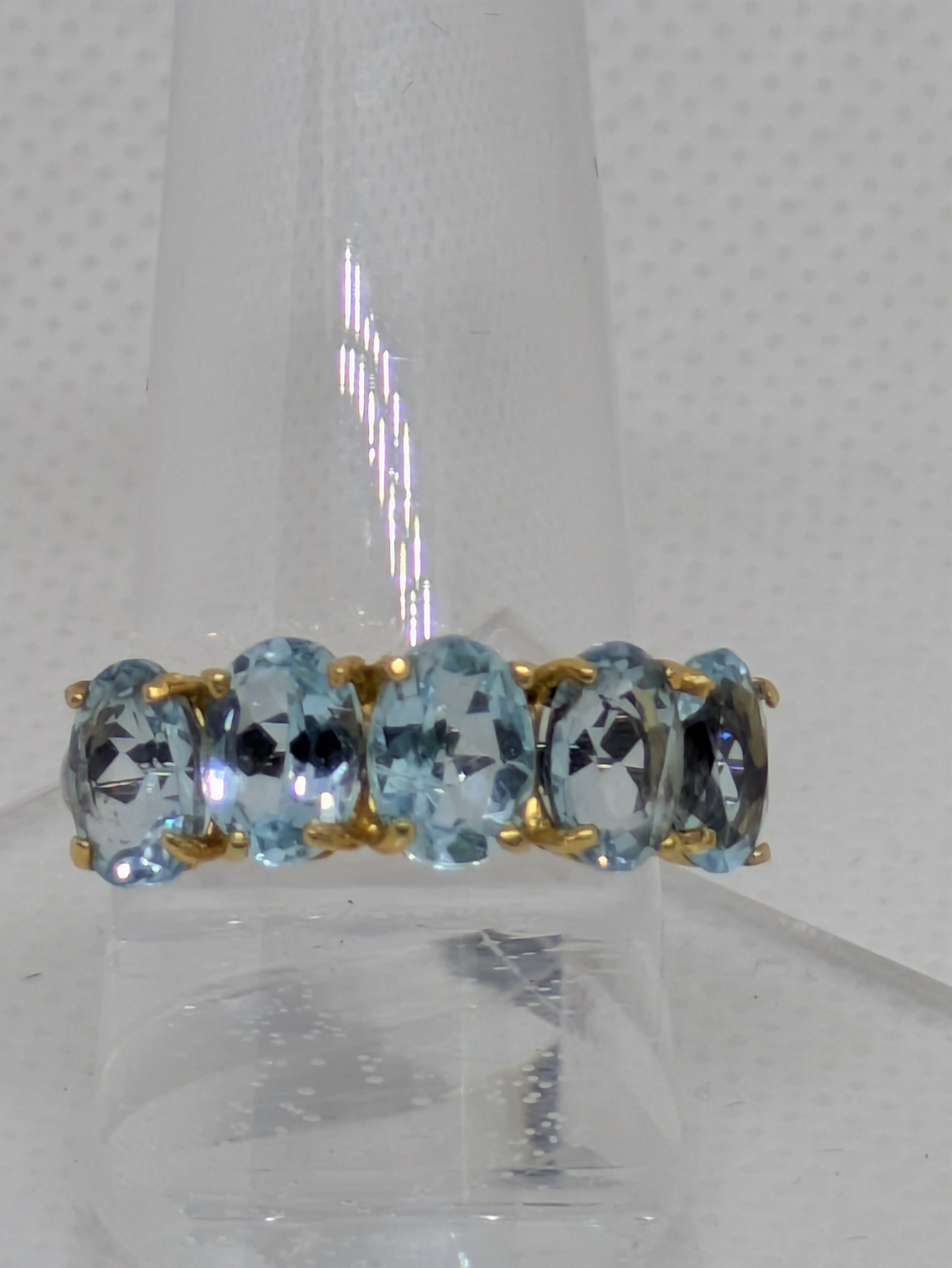 5.5 Carats Natural Blue Topaz Ring with black rhodium banding