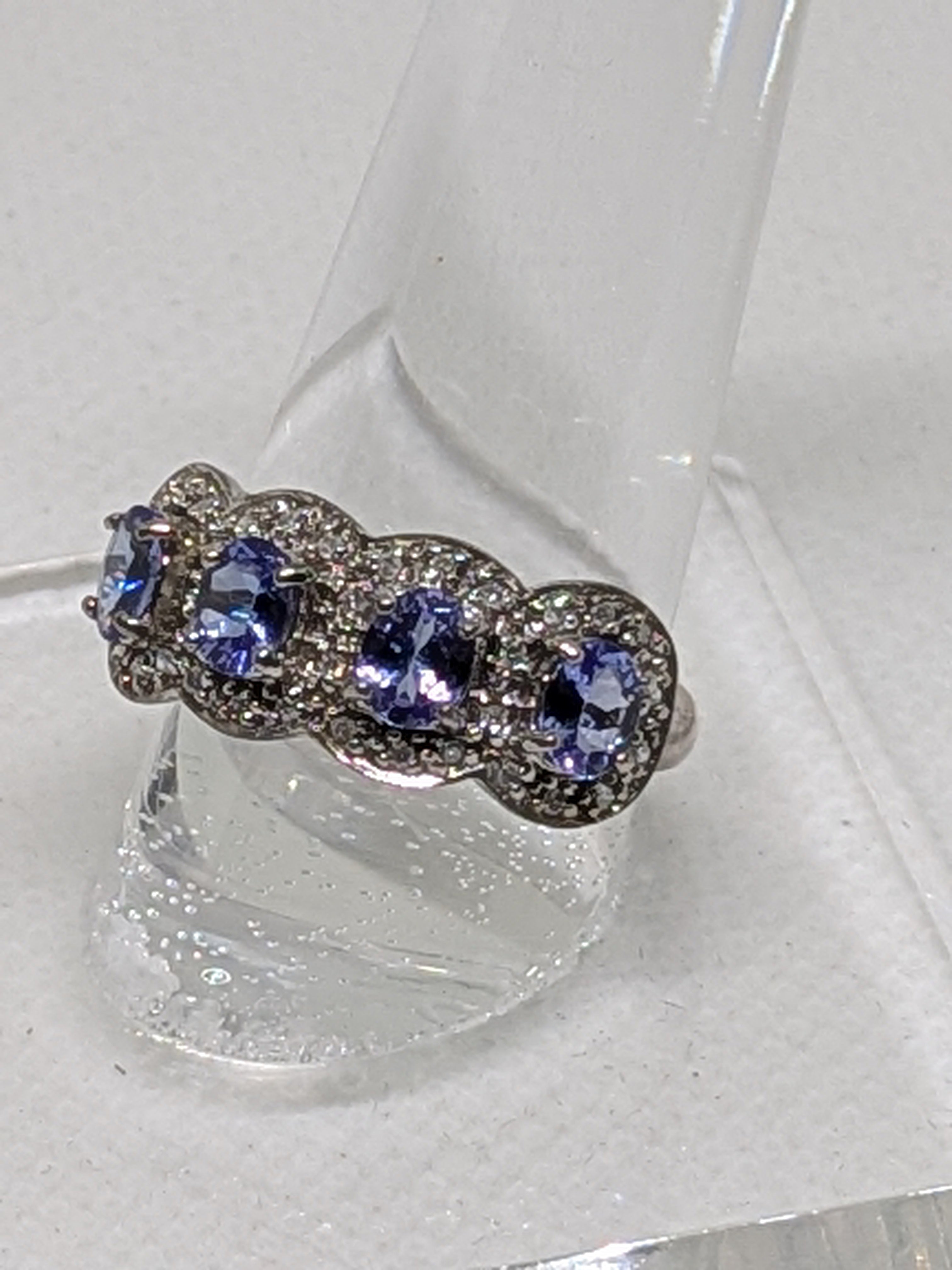 1.11 Carat Natural Tanzanite & Diamond Anniversary Ring