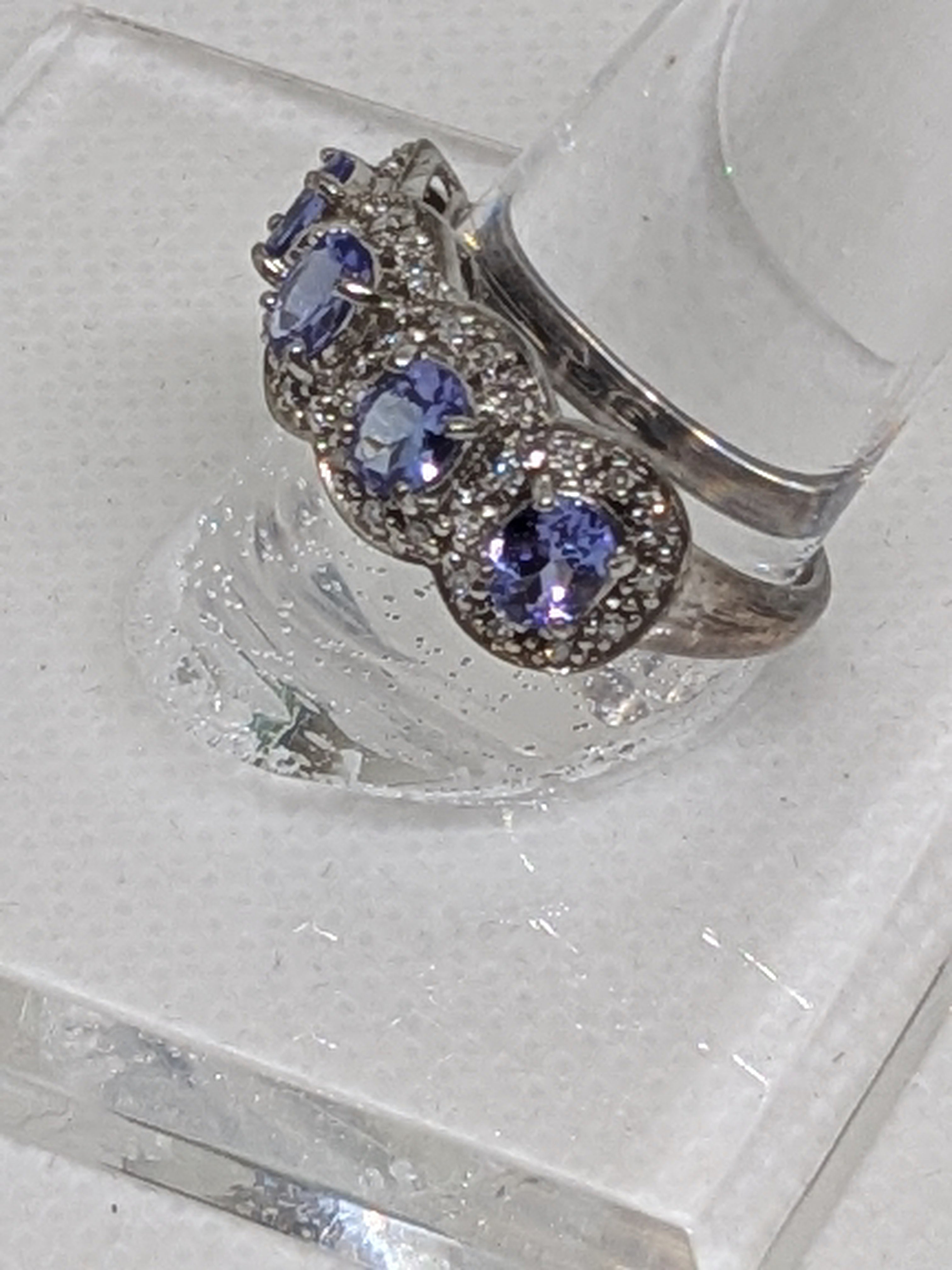 1.11 Carat Natural Tanzanite & Diamond Anniversary Ring