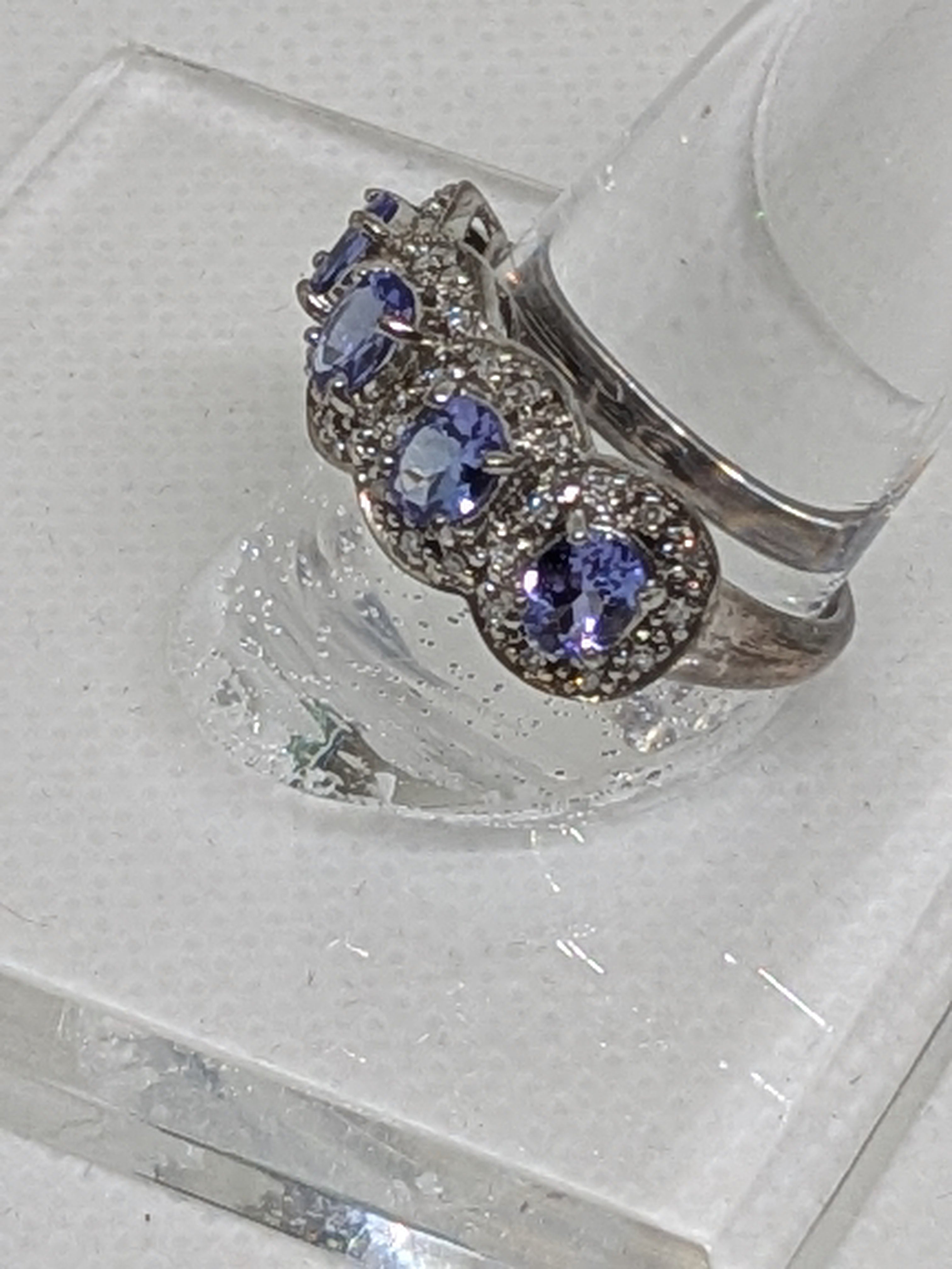 1.11 Carat Natural Tanzanite & Diamond Anniversary Ring