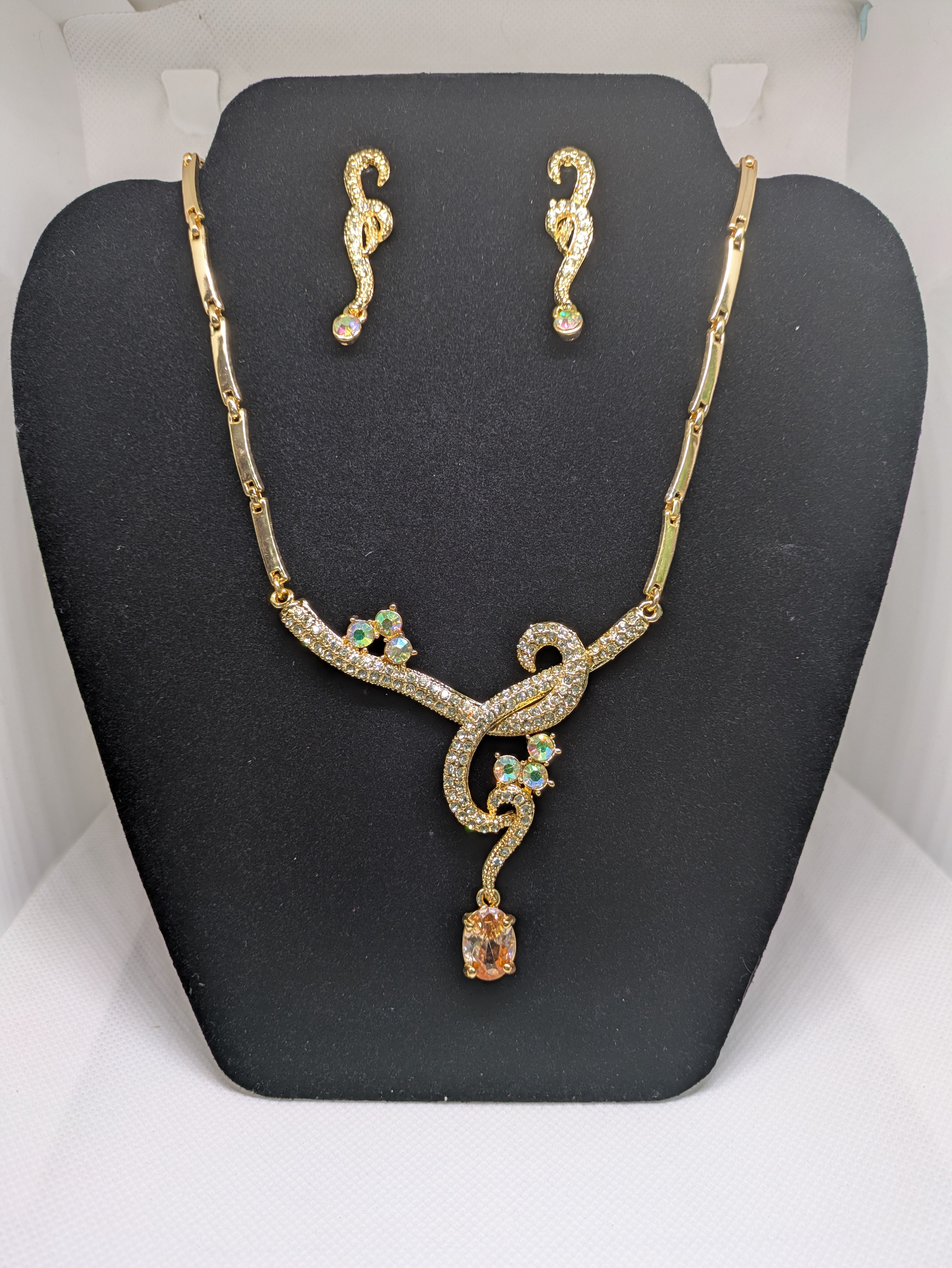 Gold tone Necklace and Pierced Earrings with faux gemstones