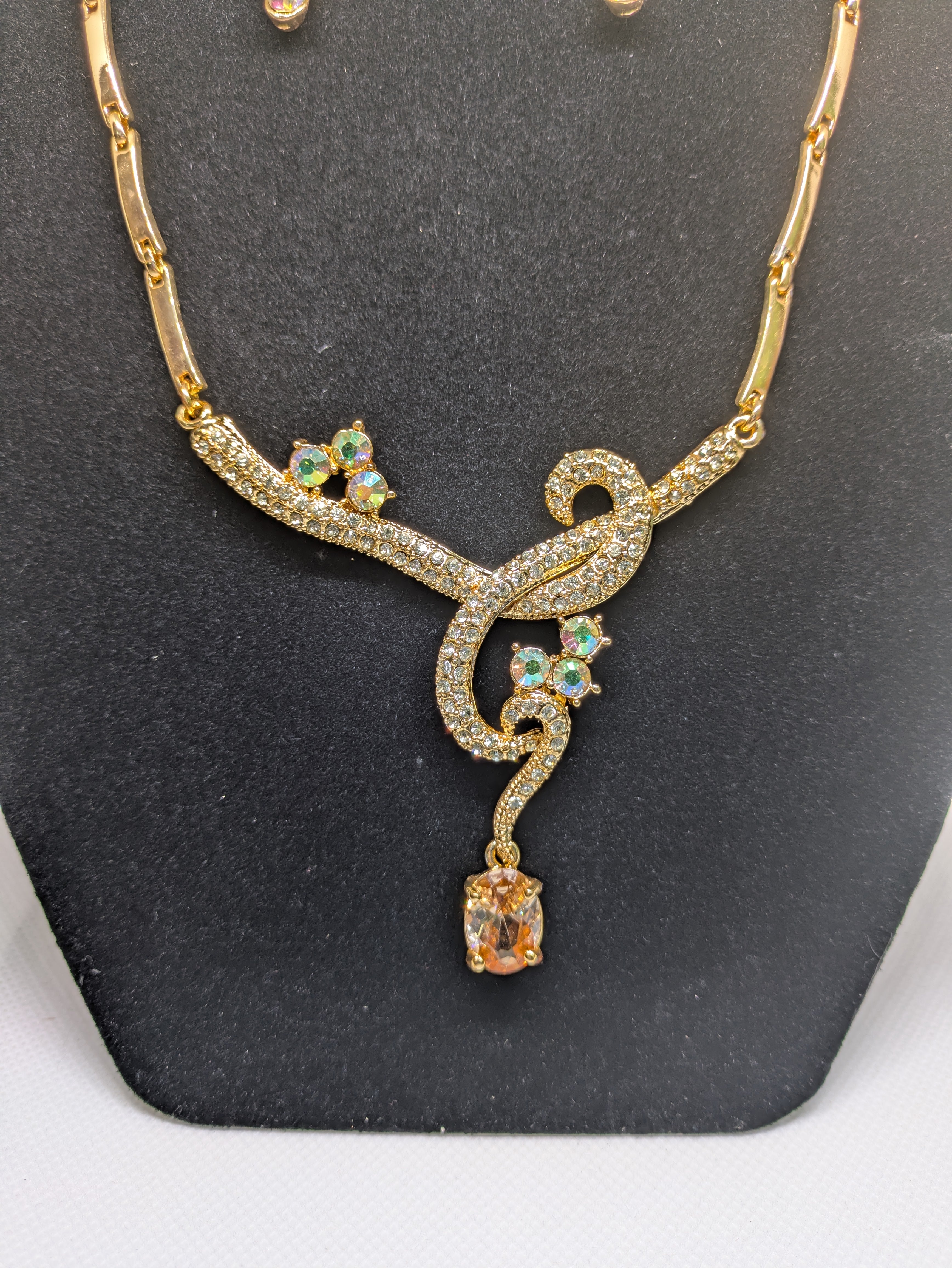Gold tone Necklace and Pierced Earrings with faux gemstones