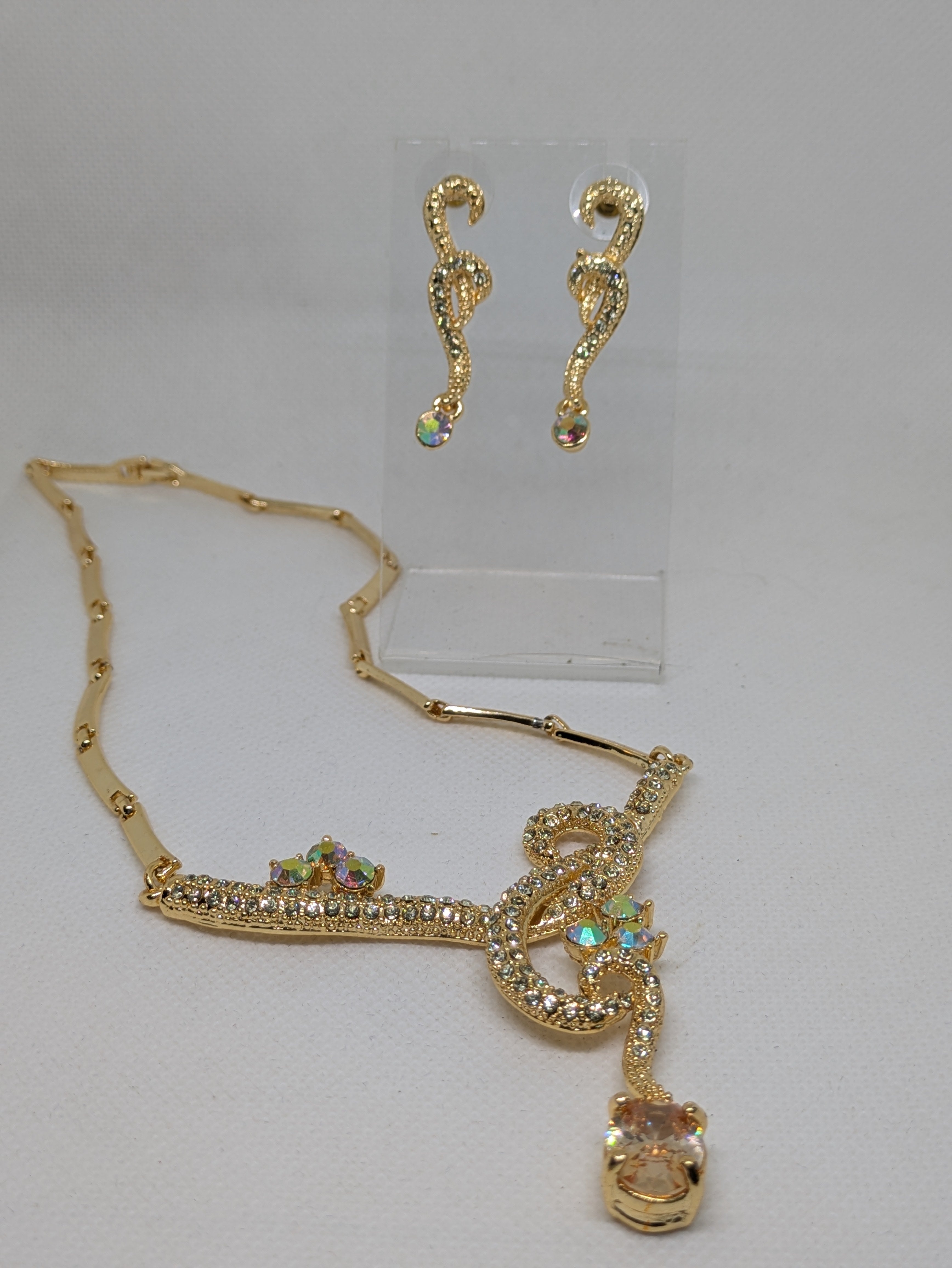 Gold tone Necklace and Pierced Earrings with faux gemstones