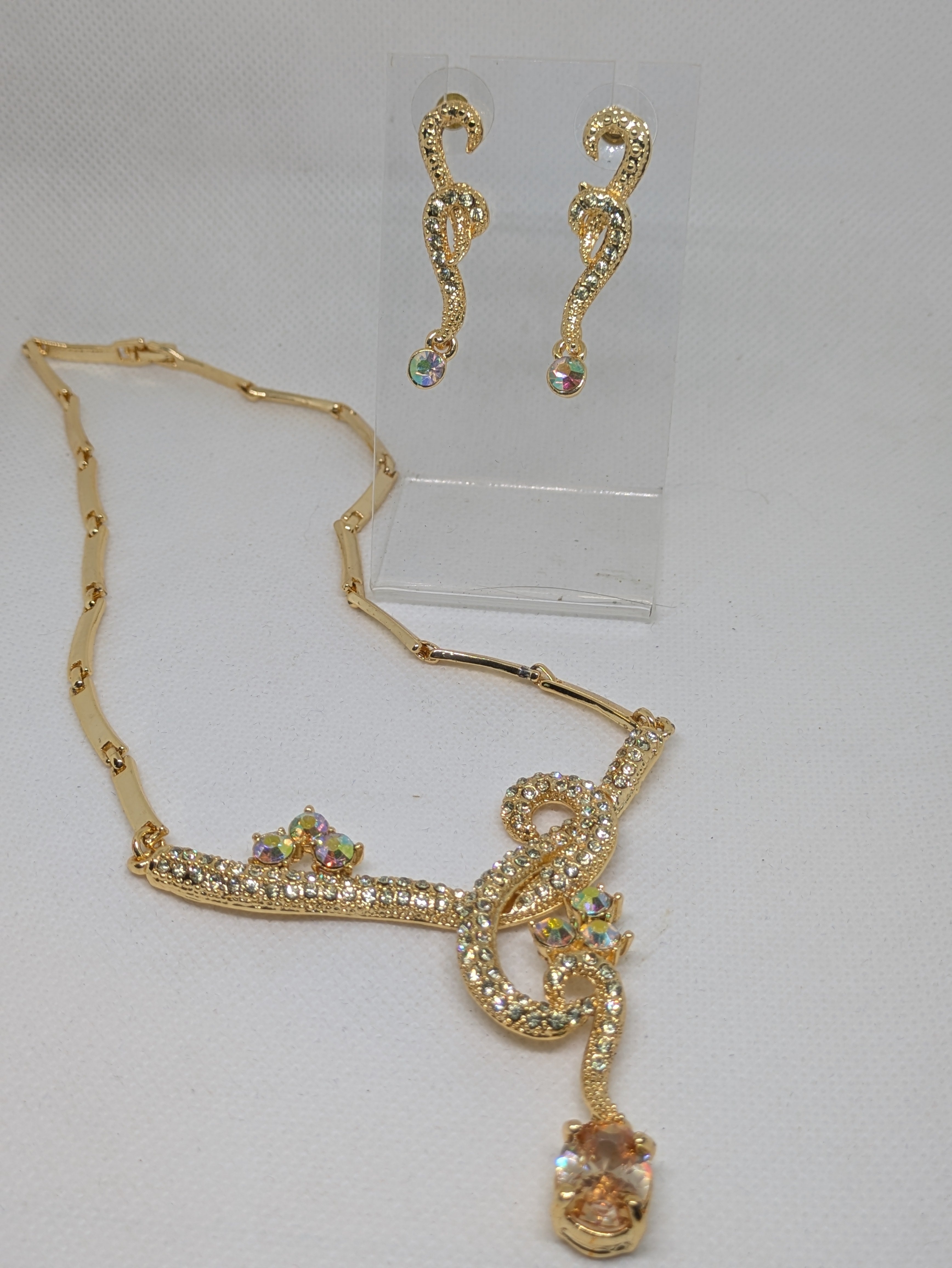 Gold tone Necklace and Pierced Earrings with faux gemstones