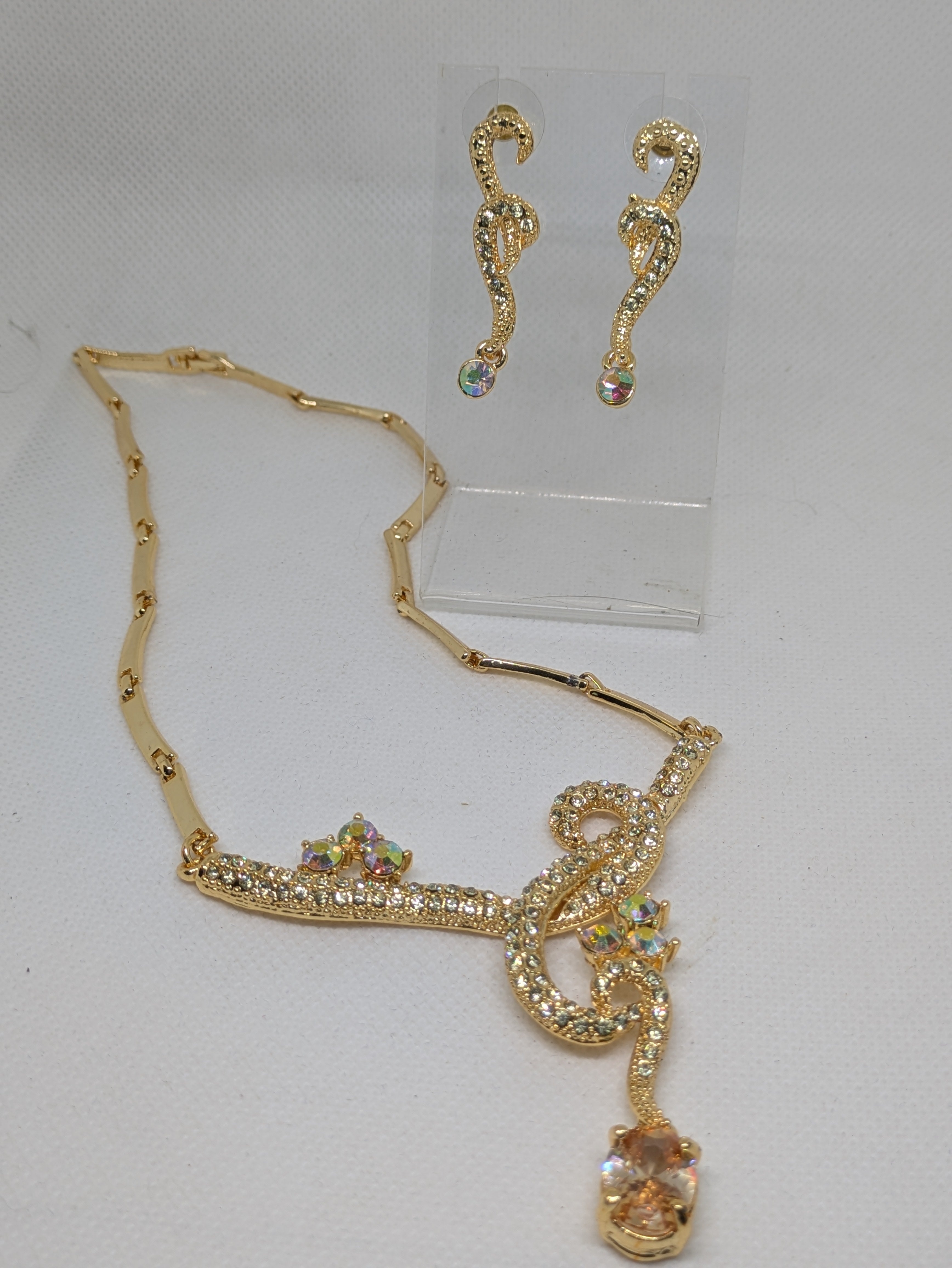 Gold tone Necklace and Pierced Earrings with faux gemstones