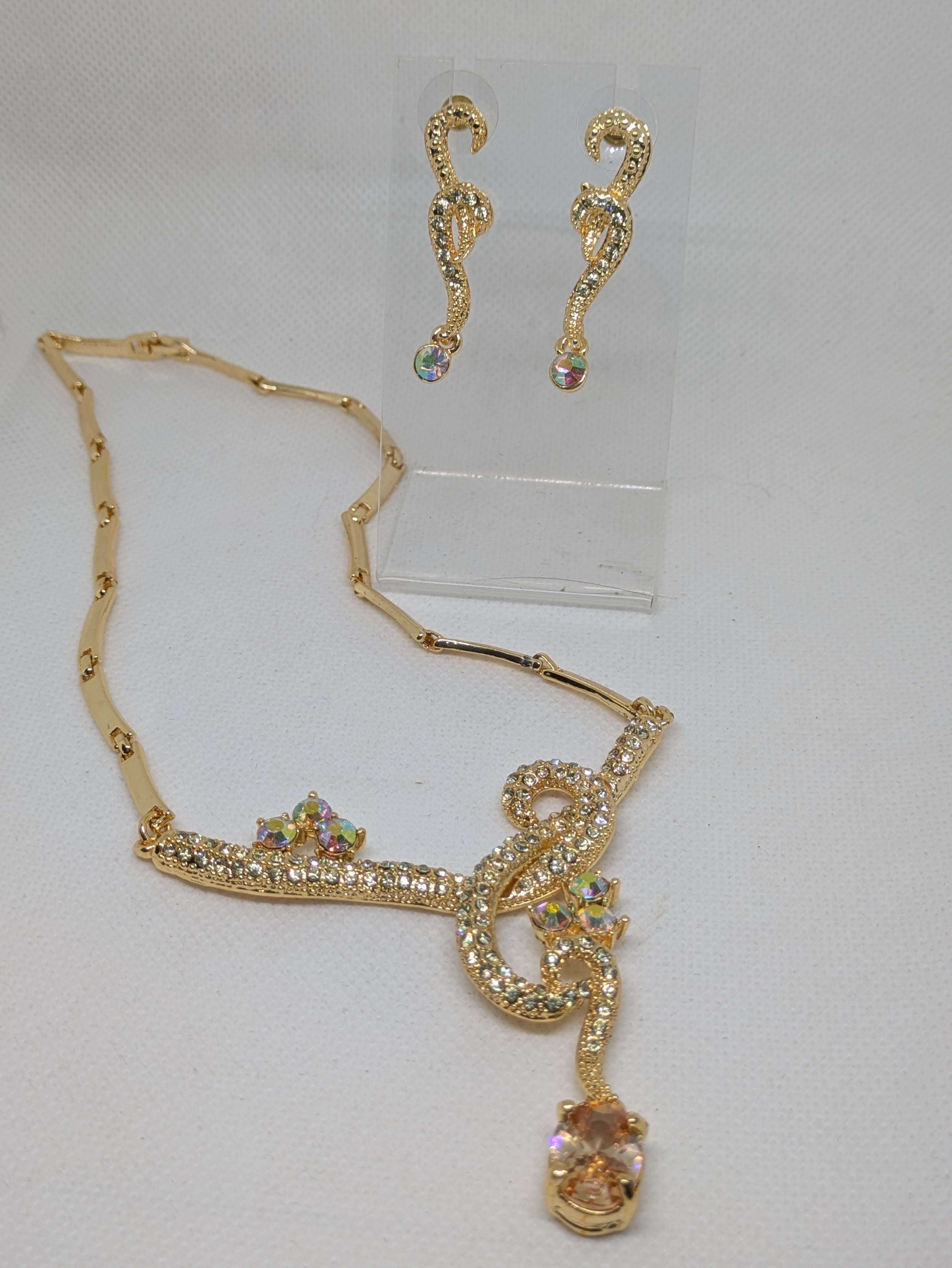 Gold tone Necklace and Pierced Earrings with faux gemstones